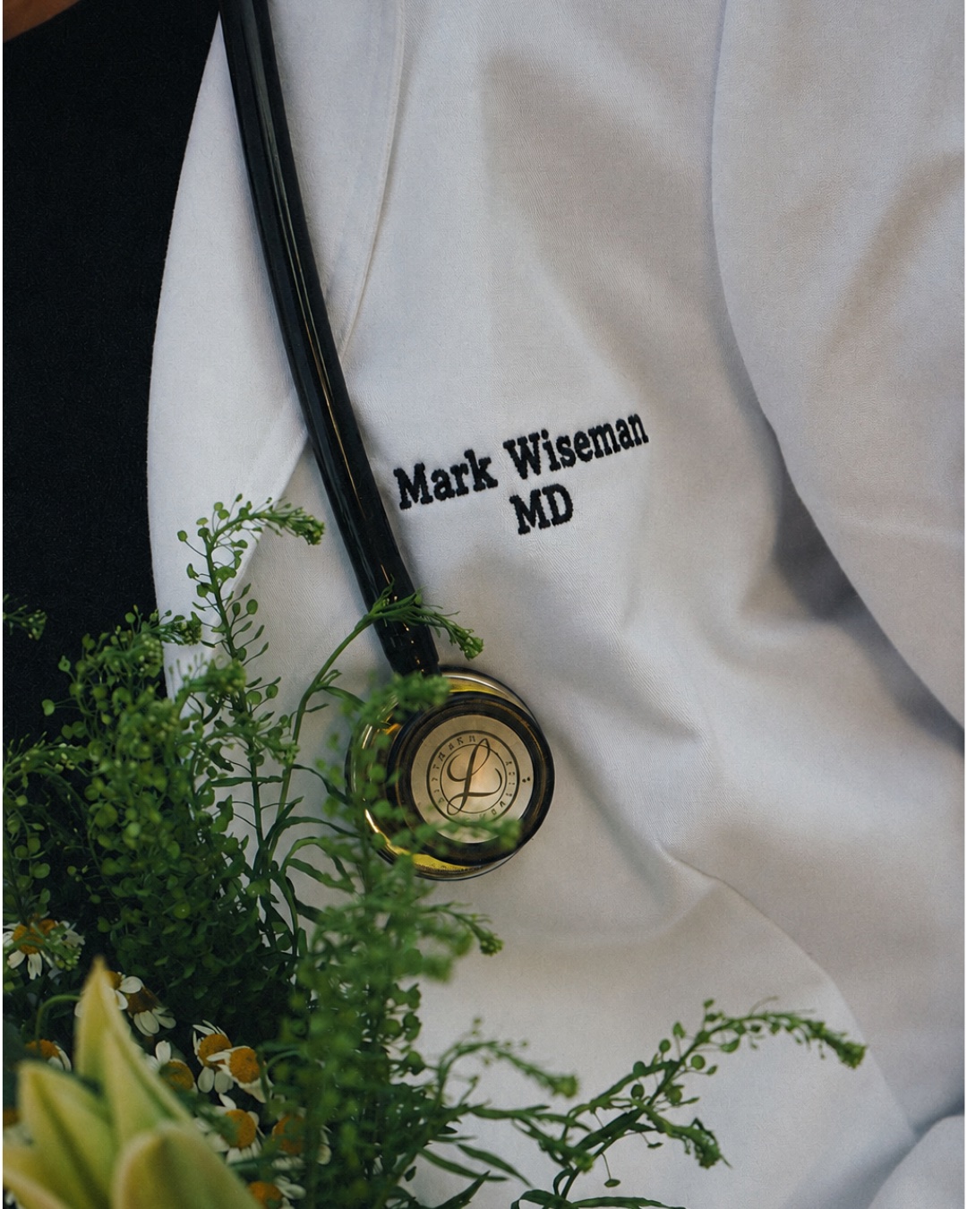Dr. Mark Wiseman's white coat and stethoscope